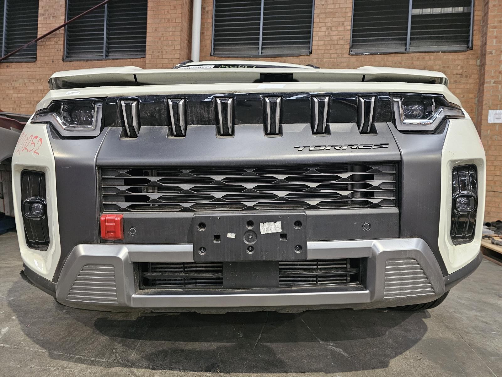 KGM TORRES FRONT BUMPER BAR J116/J140 NON EV 06/2024-2026 NMW09271